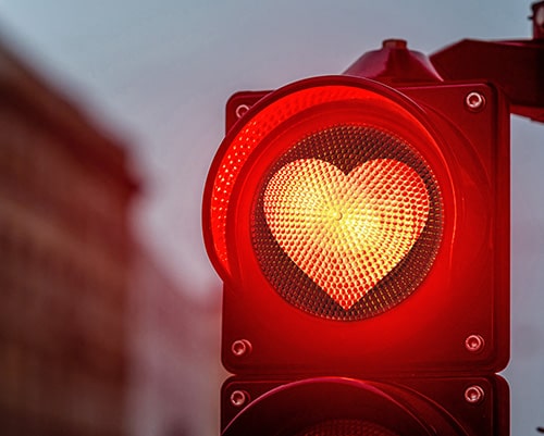 red traffic signal with heart